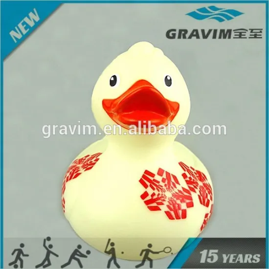 White toy duck with red printed