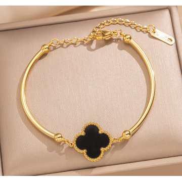 Pulsera de titanio de trébol negro elegante para mujeres