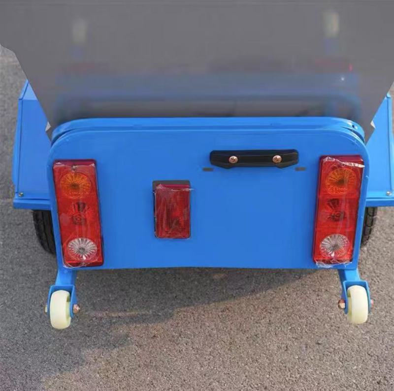 Electric three-wheeled cleaning and transportation vehicle