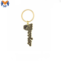 Porta-chaves com letras douradas de metal