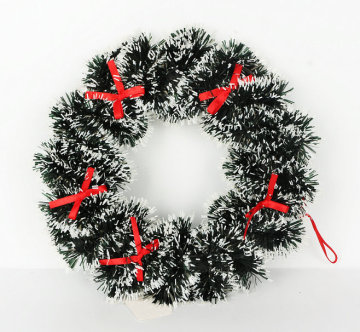 Christmas bows decorate the wreath