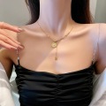 Collar de borla de oso de caricatura de moda en acero titanio