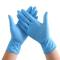 Niebieskie jednorazowe rękawiczki nitrylowe w proszku