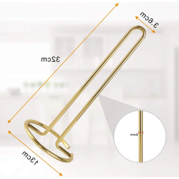 Metalen papieren handdoekhouder op keuken tafelblad