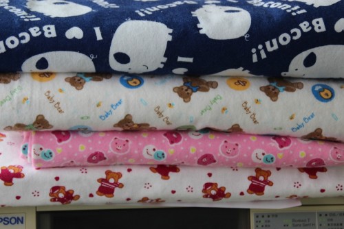 100% tela de franela de algodón para el conjunto de ropa de cama de bebé
