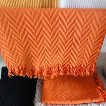 Embossed polar fleece throw, available in plain color