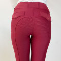 Pantaloni equestri traspiranti delle donne rosse classiche