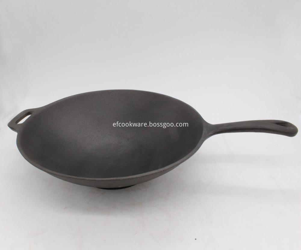 Cast iron kitchen wok for cooking