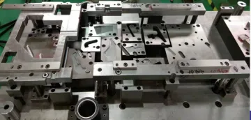 Automobile hinge progressive stamping mould