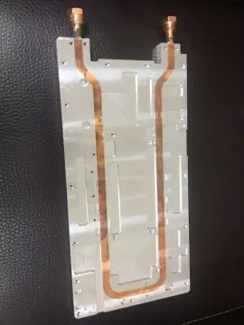 Laser device liquid cooling plate with copper Pipe
