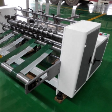 Automatic paper partition slotting machine