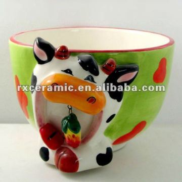 animal ceramic bowl with hanging things in mouth-cow