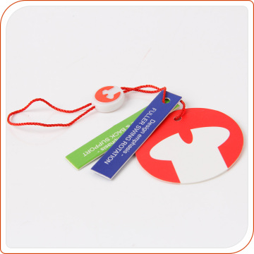 Clothing paper hang tags with plastic logo raised tag seal