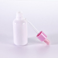 Opal white essential oil bottle with pink dropper