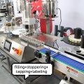 Línea automática de llenado de máquinas etiquetadoras y taponadoras de llenado de aceites esenciales líquidos de sobremesa