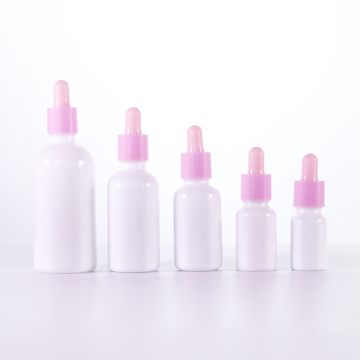 Opal white essential oil bottle with pink dropper