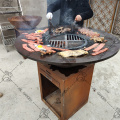 Corten steel fire pit with wooden grill bbq