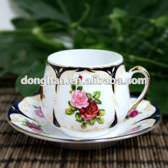 delicate stylish funny shape decal ceramic cup saucer set with gold rim