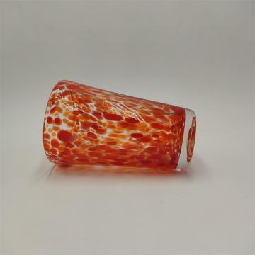 Swirled glass orange color highball glass