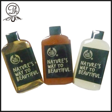 Giveaway Shampoo bottle brass pin badge