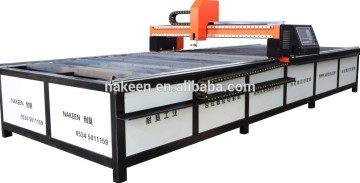 dezhou nakeen table cnc plasma 50w co2 laser engraving and cutting machine factory made with low price