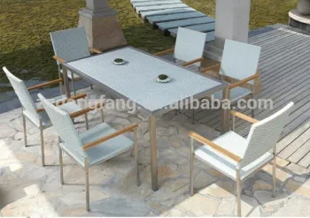 white color rattan chair and table