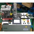 Machine de découpe de ruban d&#39;angle automatique avec trou de perforation