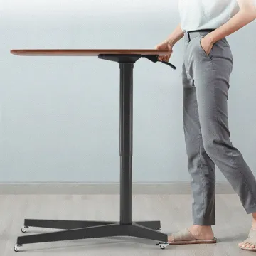 Pneumatic laptop computer tables