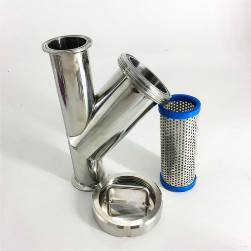 Cartridge filter housing clamped