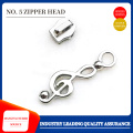 Music symbol zipper head