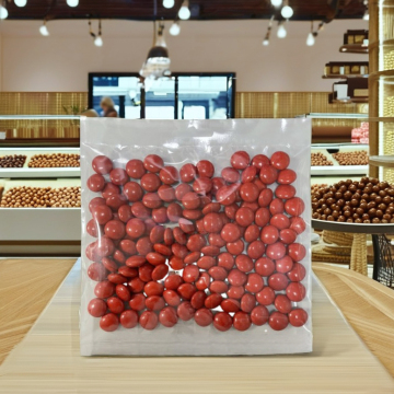 Mini-haricots au chocolat mignons avec des saveurs variées dans la boîte pour les enfants et les adultes