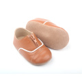 Venda quente de sapatos infantis de couro macio para bebês
