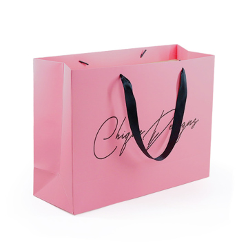 Wholesale Custom Logo Pink Luxury Paper Gift Bags with Handles for Clothes