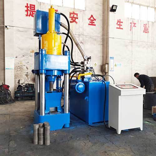 Hydraulic metal chip briquetting machine