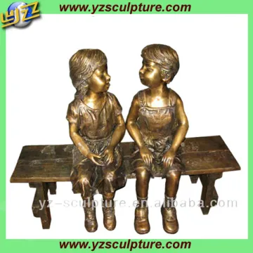 decorative brass boy and girl sculpture for sale