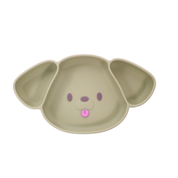 Alimentazione del bambino con piastra di aspirazione divisa in silicone con faccia di cucciolo