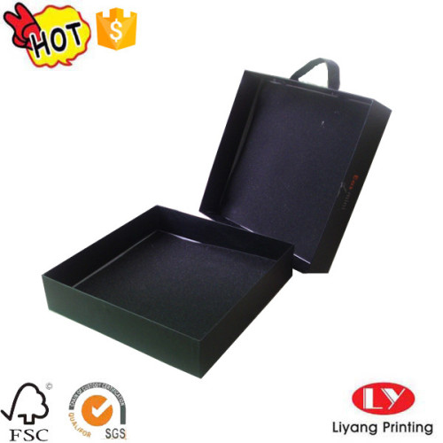 Cardboard gift packaging box with lid handle