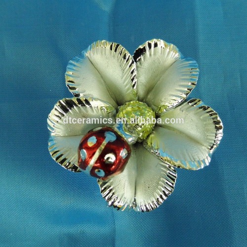Ceramic Flower with ladybird