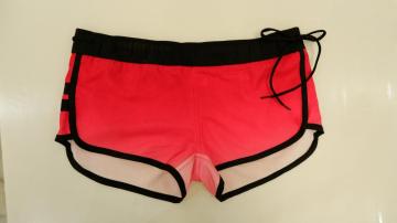 Coral women's beach shorts with bowknot
