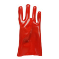 Rote Handschuhe in 27 cm Gummiflanell getaucht