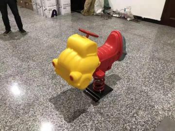 Kids play outdoor spring ride hose