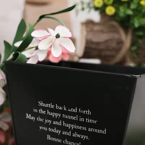 Square black flower arrangement bucket