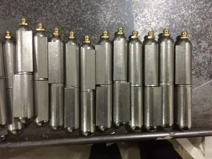 Water drop welding hinge for swing door