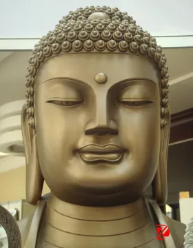 Bronze buddha head statue