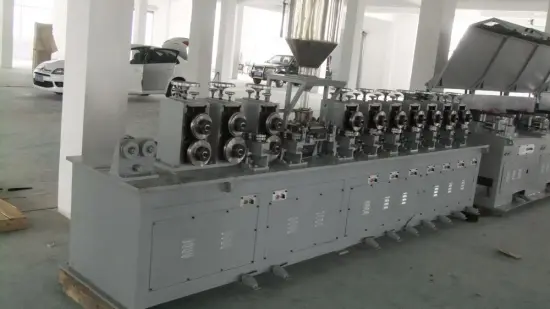 Flux cored wire producing machine