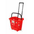 Cesta de compras plástica vermelha dos supermercados com rodas