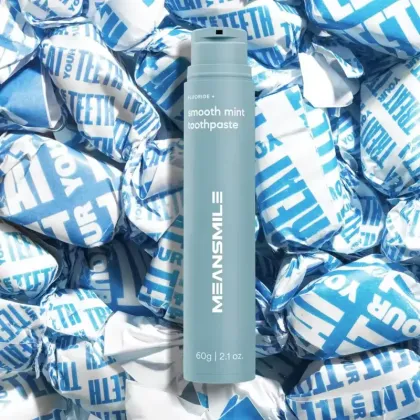Mango flavored watermelon flavored fluoride toothpaste