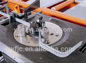 Automatic reinforcing bar stirrup bender