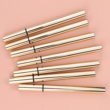 Eyeliner tahan air yang tahan lama: warna neon untuk ekstensi bulu mata dalam tabung emas vegan