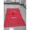 Poncho in pvc rosso con logo